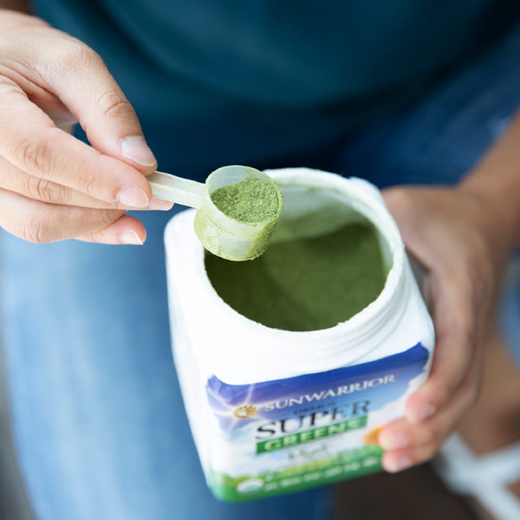 Scoop of Sunwarrior Ormus Super Greens Mint (226 g) antioxidant gluten sugar free keto paleo probiotics gut health - Raw Elements